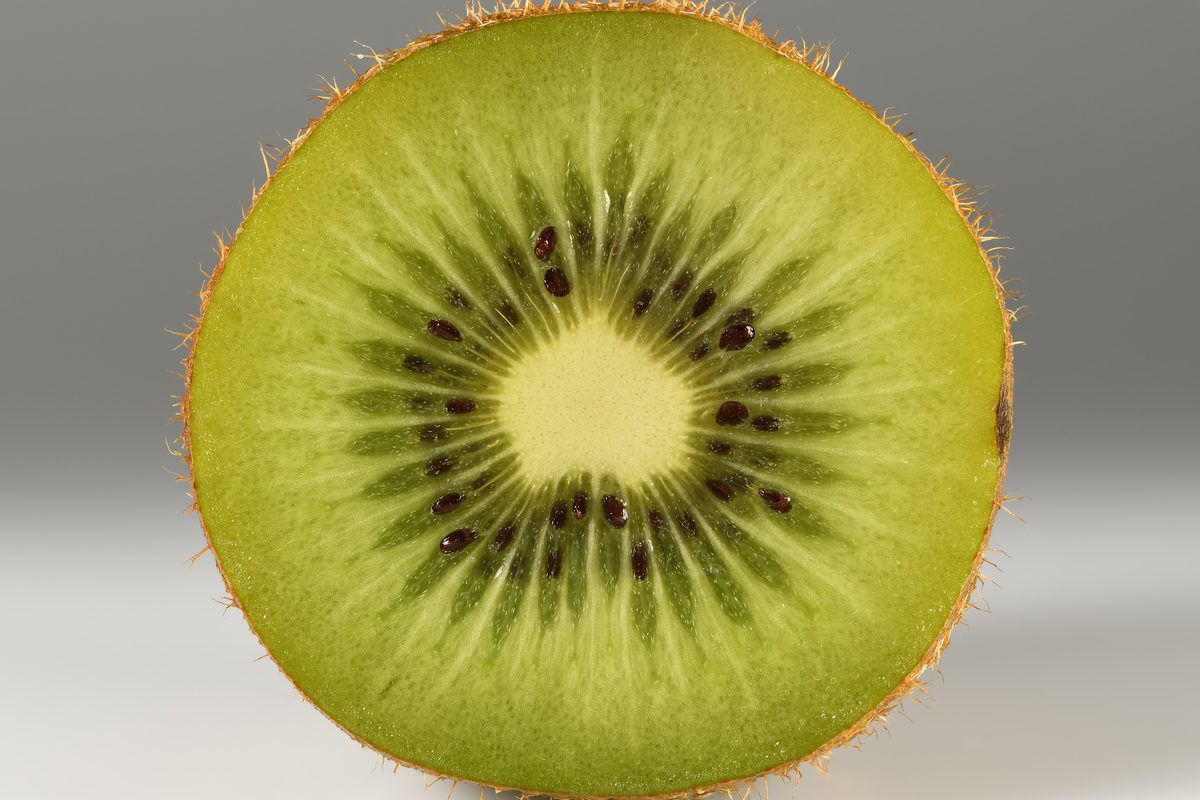 Cross section of a green kiwifruit